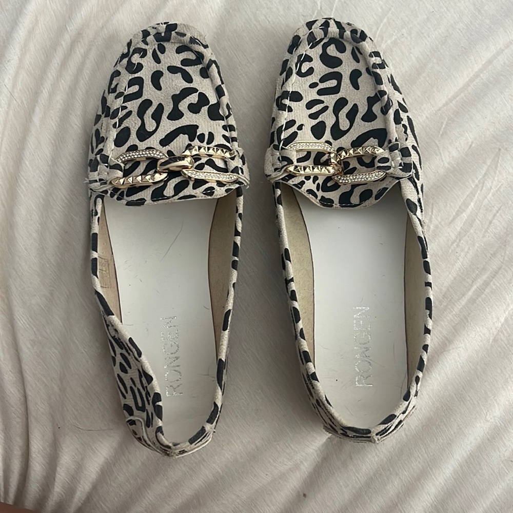 Slip on shoes. cheetah print with gold embellishments